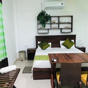 Cinnamon Airport Residencies Отель